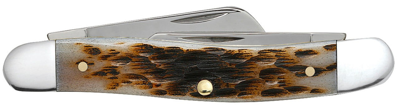 Case XX Amber Bone Peach Seed Jig Medium Stockman